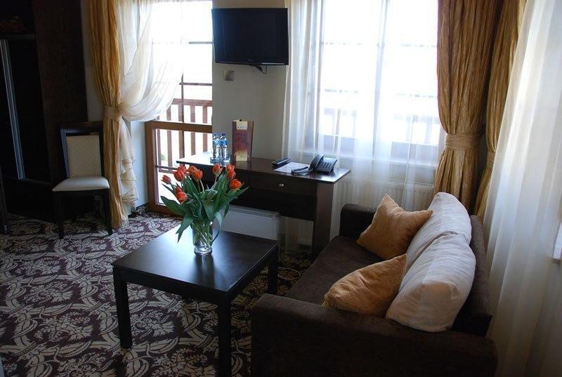 Hotel Sloneczny Brzeg Biskupiec  Rum bild